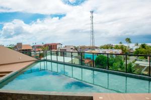 Apto a 150m da praia, Rooftop com piscina & sauna em Porto de Galinhas