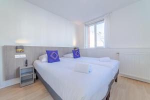 Appart'hotels Montempo + Apparthotel Toulouse Cite Internationale : photos des chambres