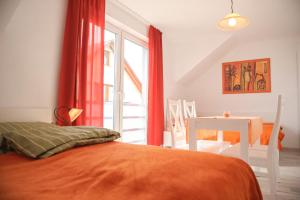 Słoneczna Bryza - domek, pokoje i apartamenty