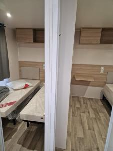 Campings DC - L'Amira 3ch, 2 SDB, 40m2, Confort et detente : photos des chambres