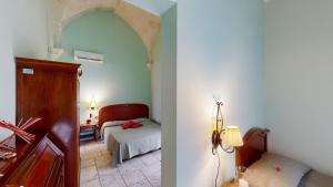 Triple Room room in Relais Reggia Domizia