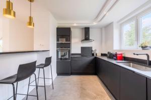 Appartements Large 130 m² 4-bedroom apartment : photos des chambres