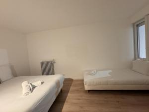 Appartements Le Repere des Pilotes - Gare - 11p - Reve au Mans : photos des chambres