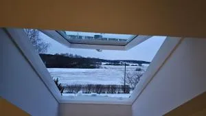 Attic floor with views over fields and sea - Krusenberg