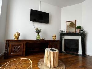 Appartements Grand F2 proche du centre ville. : photos des chambres