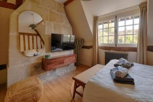 Maisons de vacances L-Ecrin de Luxe by Les Maisons de Charloc Homes : photos des chambres