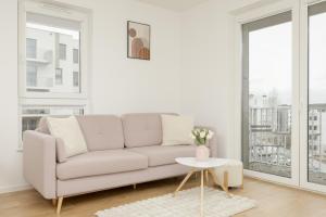 Bright Pastel Apartment with Desk for Remote Work, Balcony and Parking by Renters