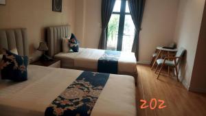 Khách Sạn The One Hotel 1