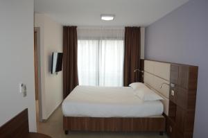 Hotels Hotel Port Toga : photos des chambres