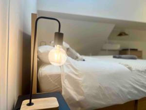 Le contemporain - Plein centre, place du Marché