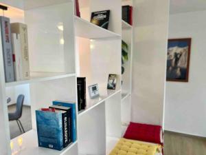 Le contemporain - Plein centre, place du Marché