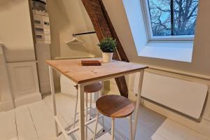Appartements Le perchoir, studio avec mezzanine : photos des chambres