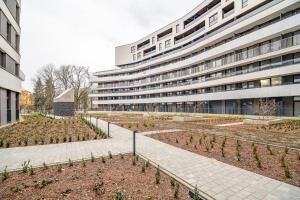 Kraków Business Suite - City View with Balcony & Parking by Rentujemy