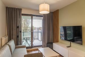 Kraków Business Suite - City View with Balcony & Parking by Rentujemy