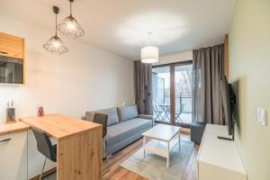 Kraków Business Suite - City View with Balcony & Parking by Rentujemy