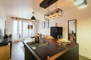Appartements Casa de Bezons - T2 de 39 m2 a 15' La Defense, proche Paris : photos des chambres