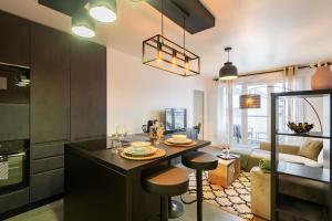 Appartements Casa de Bezons - T2 de 39 m2 a 15' La Defense, proche Paris : photos des chambres