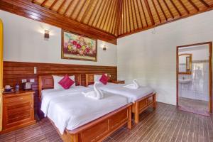 Phòng Hai Giường Đơn Loại Sang (Deluxe Twin Room)