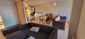 Appartements Appartement les pieds dans l'eau : photos des chambres