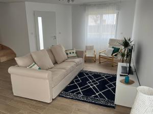 Villas Superbe Maison avec jardin : photos des chambres