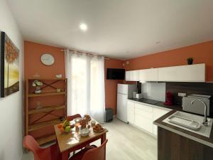 Appartements La riche histoire de Pezenas : photos des chambres