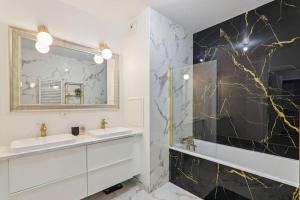 Appartements Appartement design pres Defense : photos des chambres