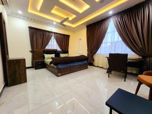 Deluxe Double Room (2 Adults + 1 Child) room in Motorway Majesty Lodges - Near Islamabad International Airport & Motorway