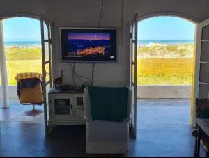 Casa pé na areia frente ao mar. Praia da Juréia. - Ilha dos Papagaios