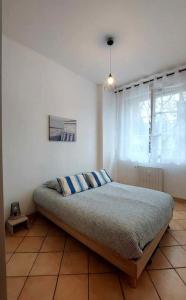 Le calme au centre-ville dans une cour intérieure, avec place de parking privée