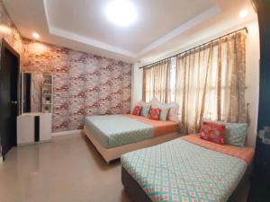 บ้านรัชนี ปาร์ตี้ พูลวิลล่า หัวหิน 3 ห้องนอน มีสระผู้ใหญ่และสระเด็ก ครัวยุโรป