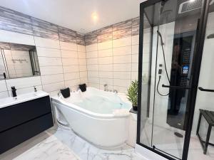 Appartements E Servagnat T3 luxe avec Sauna Jacuzzi et Hammam : photos des chambres