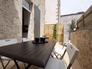 Appartements La perle de Re au coeur de Saint Martin : photos des chambres