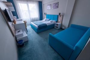 Deluxe Family Room (2 Adults + 1 Child) room in Complex Turistic Monaco