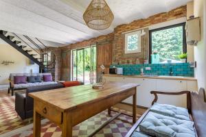 Maisons de vacances La maison du palefrenier : photos des chambres