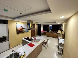 Family Studio room in GOLD crest sunset luxury apartment