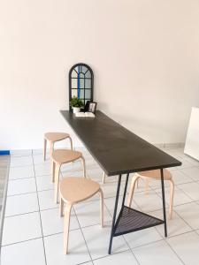 APPARTEMENTS DU BOURG • WIFI • CLIM : photos des chambres