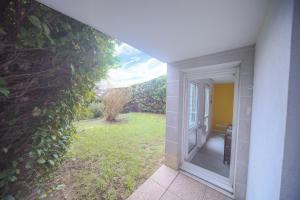 Appartements Appartement en rez-de-chaussee avec jardin : photos des chambres
