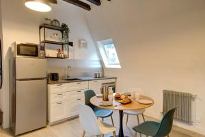 Appartements Coeur de Ville - T3 - 6 personnes - Arrivee Autonome : photos des chambres