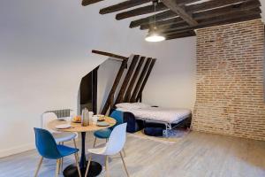 Appartements Coeur de Ville - T3 - 6 personnes - Arrivee Autonome : photos des chambres