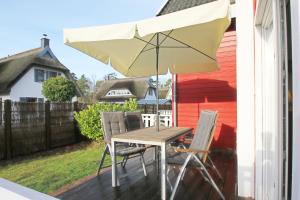 Ferienhaus Wellenläufer Haus - Sauna, Terrasse, Garten