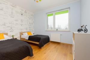 2 Bedroom Apartment Beautiful Green Surroundings Międzyborska Street by Renters