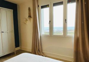 Maisons de vacances Beach House 50 : photos des chambres