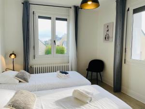 Maisons de vacances Beach House 50 : photos des chambres