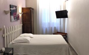 Hotels Au Nouvel Hotel : photos des chambres