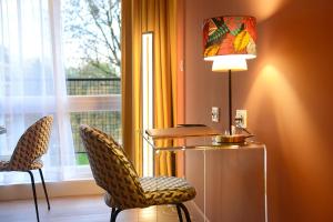 Appartements Suite Business : photos des chambres