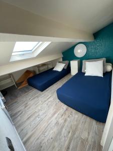 Appartements Le bruit des vagues en dormant : photos des chambres