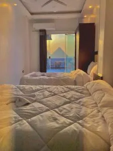 Enjoy Giza Pyramids View - Al Kawm al Akhḑar