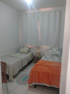Apartamento com AR Condicionado, CondomÃnio aconchegante com piscina 2 Qts