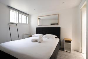 Appartements Cosy apartment in Courbevoie - Welkeys : photos des chambres