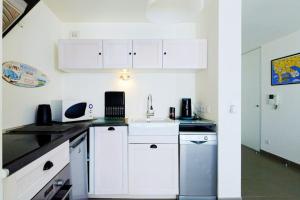 Super T2 Climatisé avec Balcon à pied plage Catalan